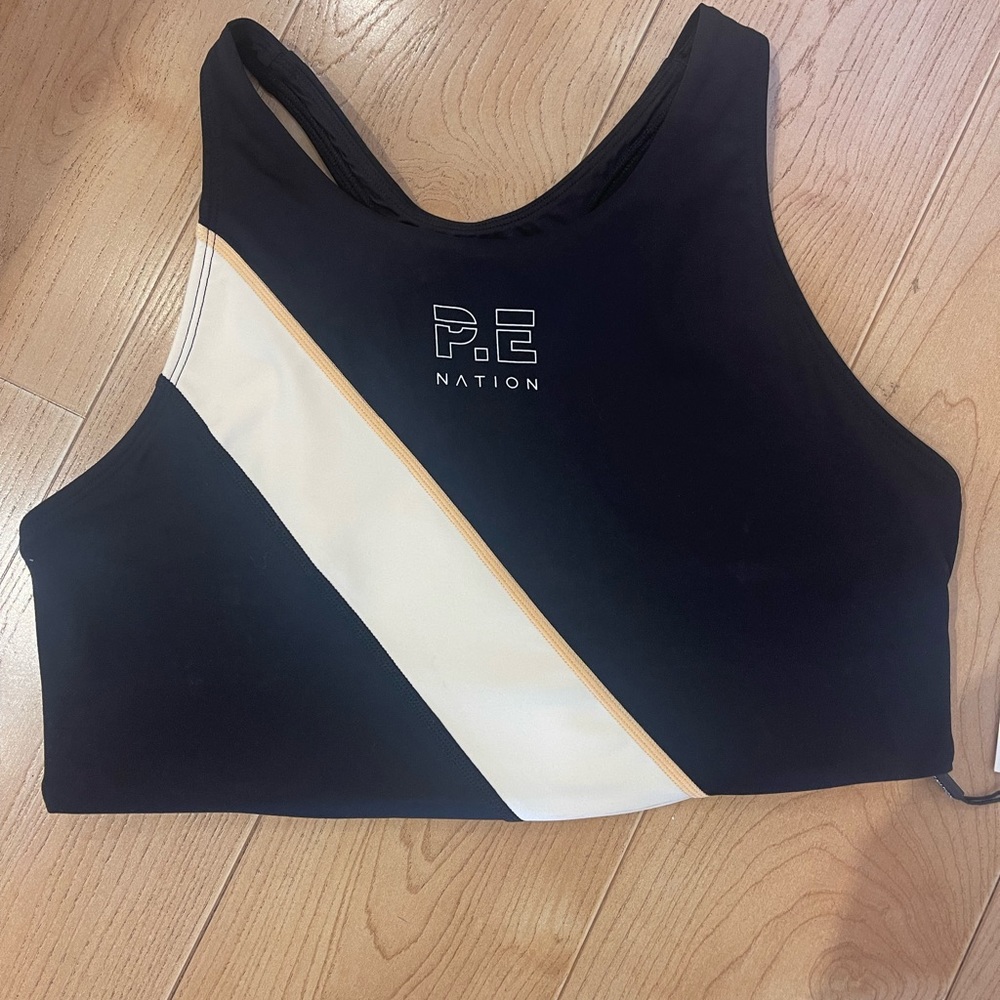 NWT PE Nation sports bra, super stylish color blocking and on trend.